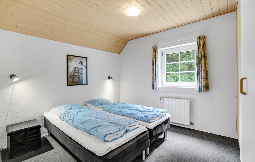 Et af de 9 soveværelser i luksushus nr. 135