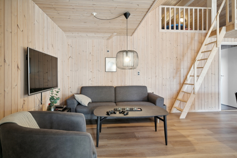 Dyst i sommerhusets aktivitetsrum, når I besøger luksushus nr. 176 i Vestjylland.