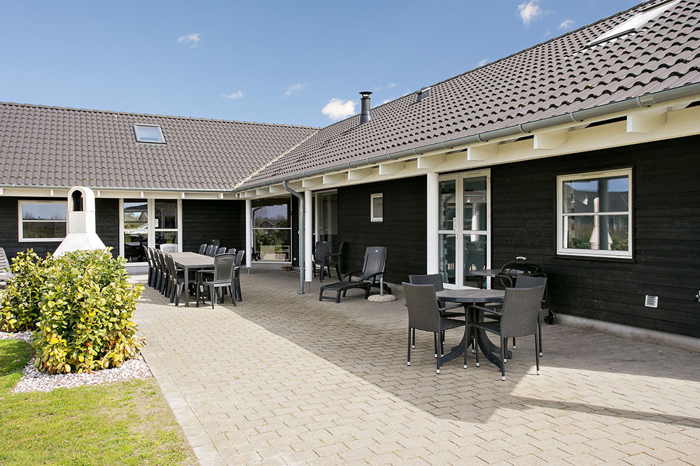 Nyd en grillaften på terrassen i luksushus nr. 214 i Lolland/Falster/Møn